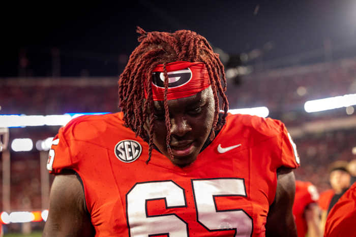 Georgia Bulldogs tackle Amarius Mims (65) reminiscing their win over Ole Miss on Mov. 11, 2023. (Brooks Austin / Dawgs Daily).